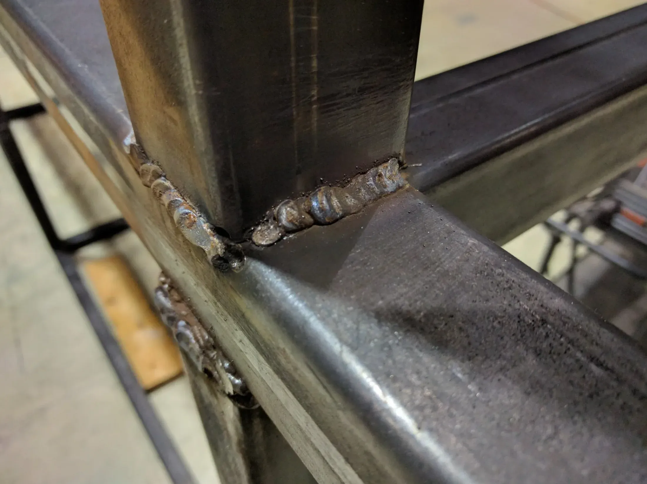 MIG practice beads from day 1 with uneven bead profile