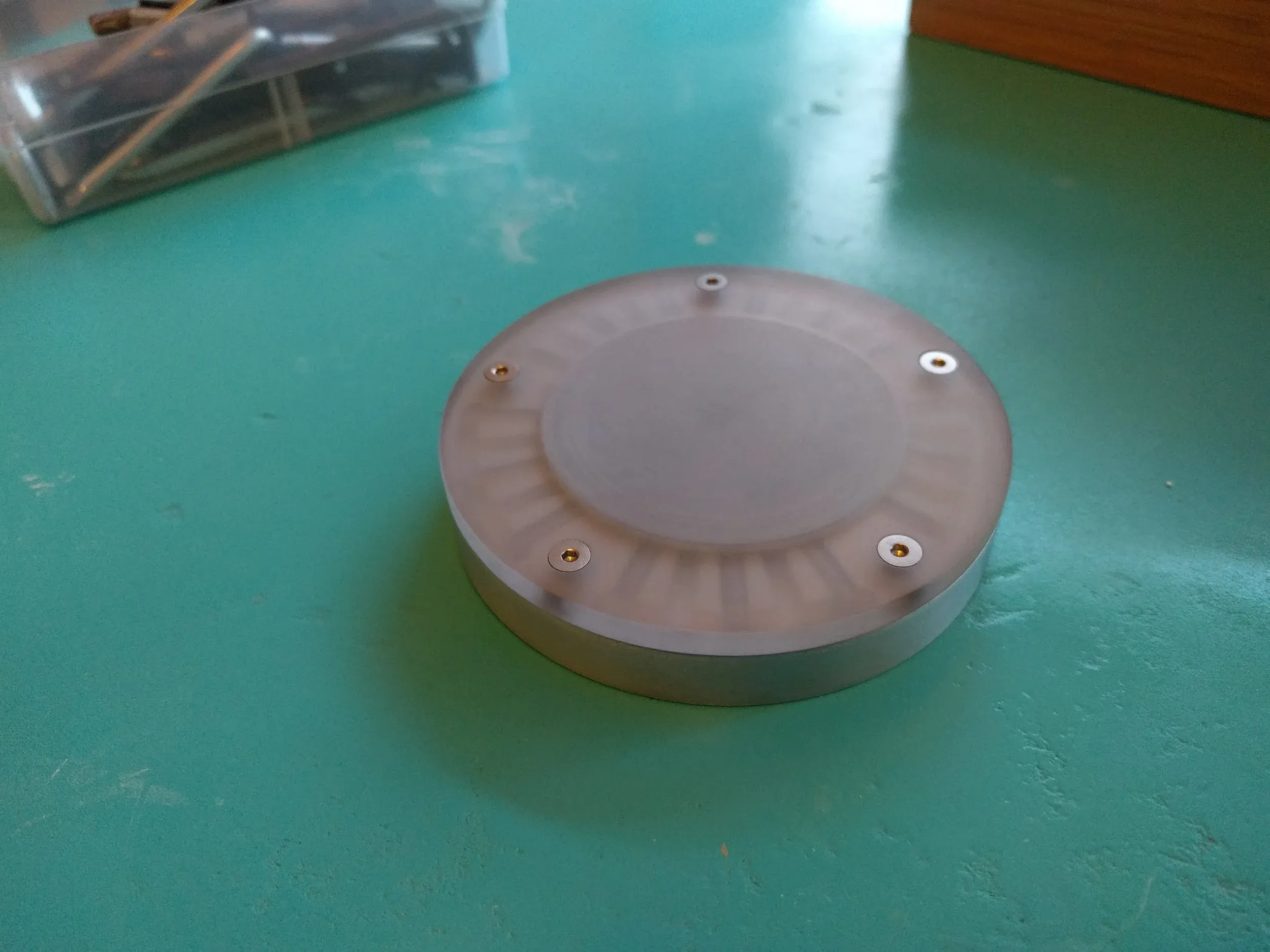 The puck and base assembly together again. The puck can be re-locked with a quick shake, once everything's back together.