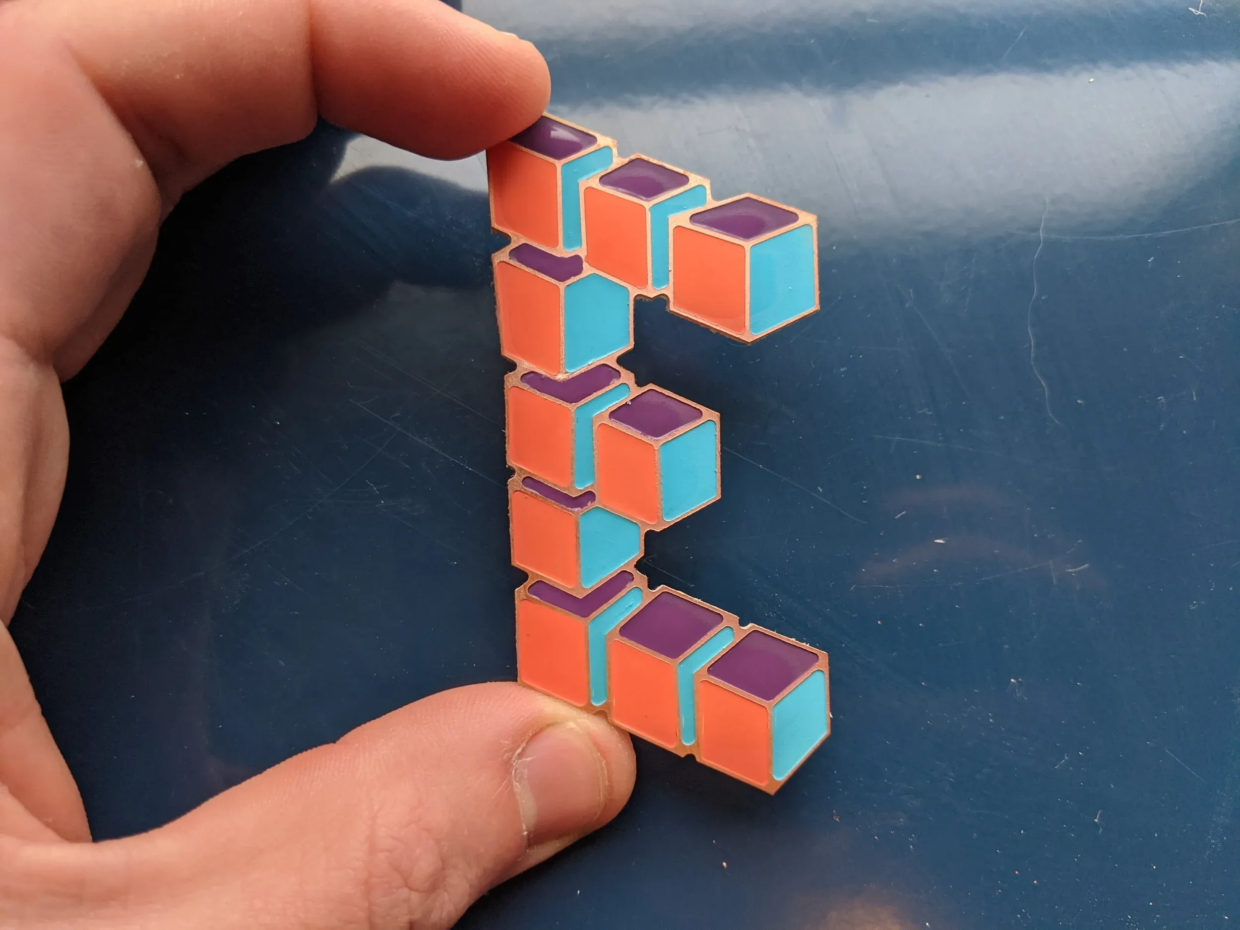 10. Painted cubic "E"