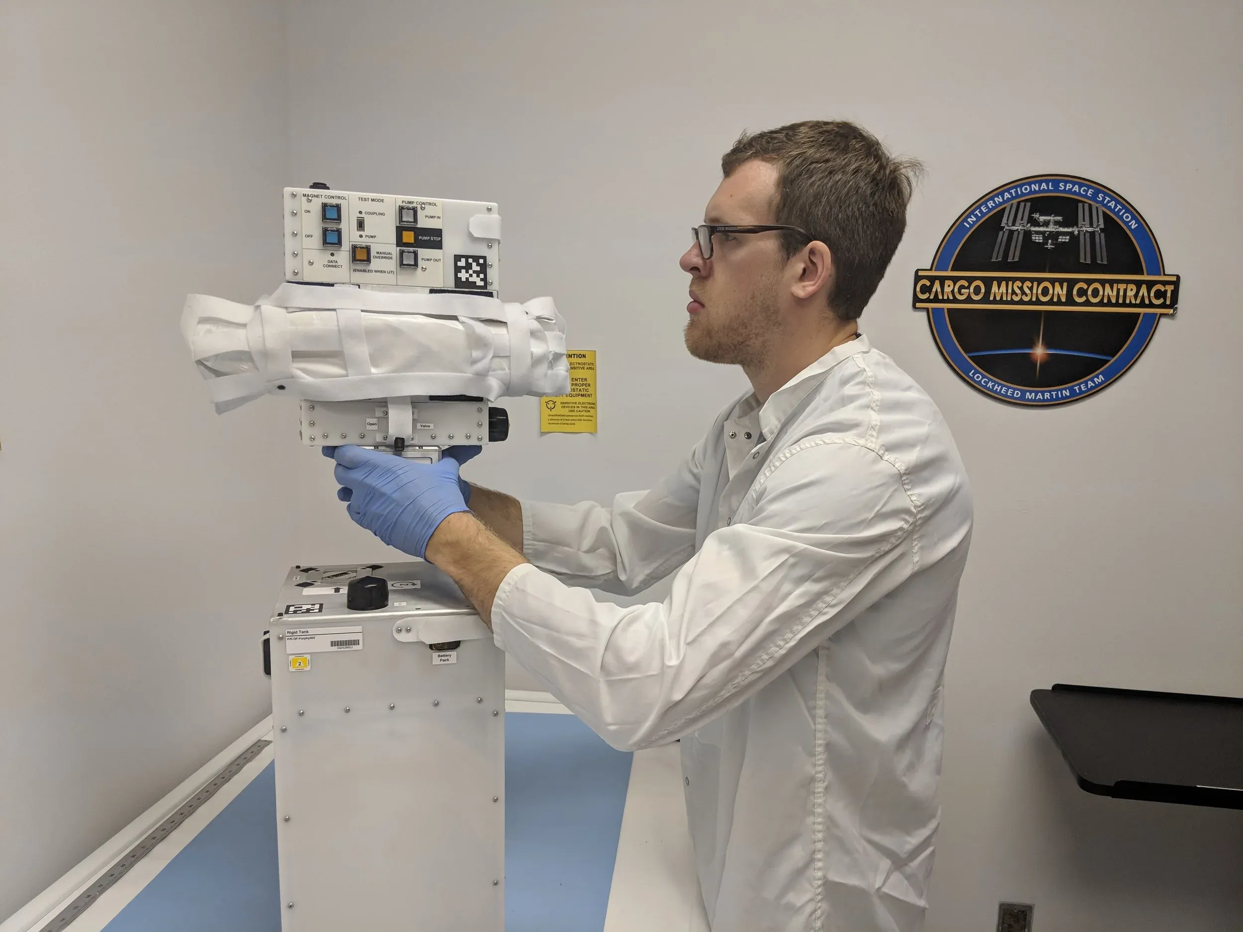 Preparing OrbitFab's Furphy for launch to the ISS in October 2018.