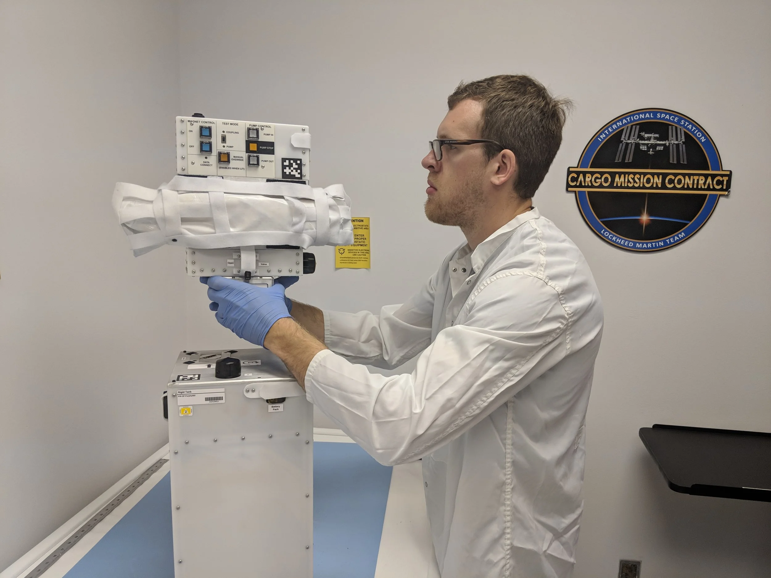 Preparing OrbitFab's Furphy for launch to the ISS in October 2018.