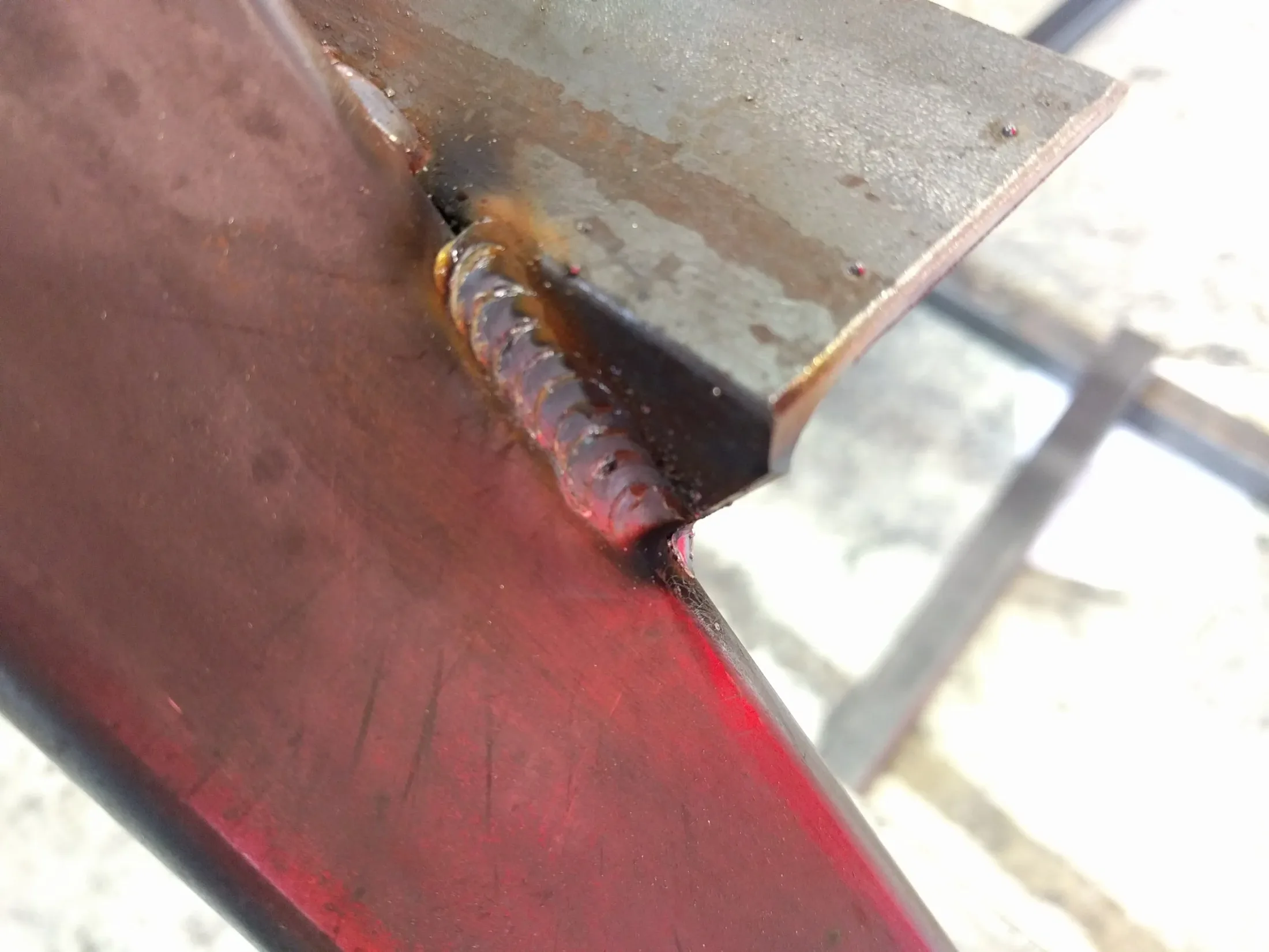 MIG practice bead from day 5 showing cleaner penetration