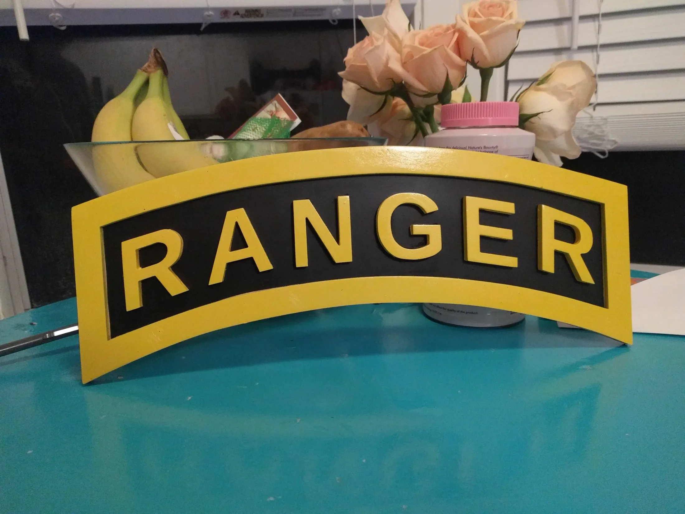 Finished Ranger Tab sign with yellow lettering on black backer